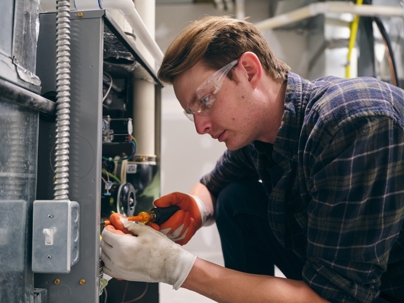 main inspecting a furnace